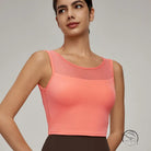 Beauty Back Mesh Workout Top: coral sleeveless crop with sheer chest panel