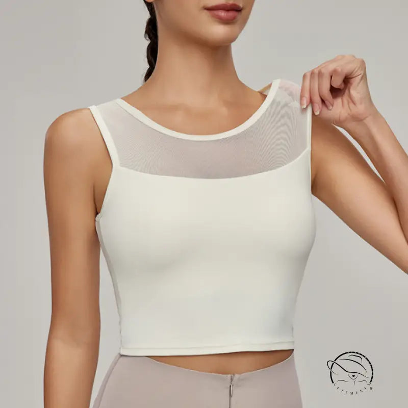 Beauty Back mesh workout top with sleeveless design and mesh yoke