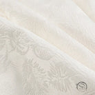 Cream-colored floral brocade Langry fashion dress fabric with leaf patterns