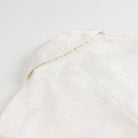 White lace Langry fashion baby dress with ruffled hem and floral V-neck