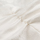 Cream lace fabric with floral patterns in Langry V-neck jacquard dress