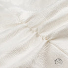 Cream lace jacquard fabric with floral patterns in langry fashion dress