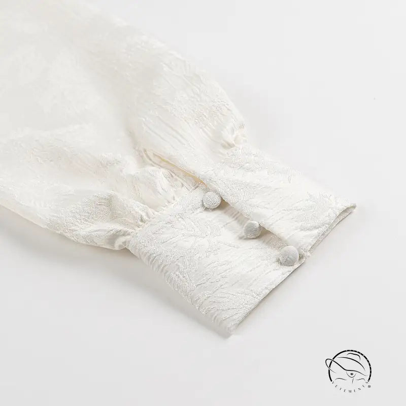 Langry fashion white fur coat with pom-poms on V-neck jacquard dress