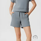 Gray casual loose yoga shorts with drawstring waist and side pockets
