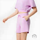 Pink casual loose yoga shorts with drawstring waist and side pockets