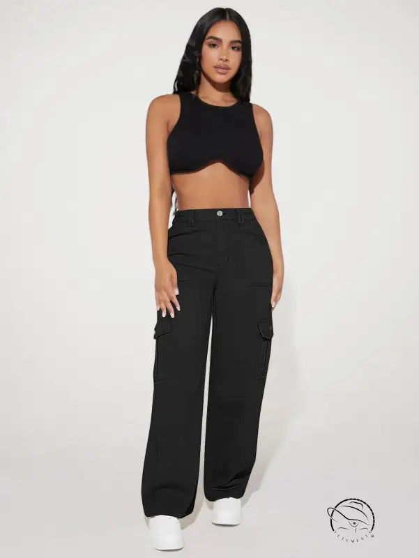 Woman in black crop top and cute casual pants