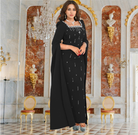 Elegant black dress with cape sleeves from Sleeve Drilling, perfect for fashion enthusiasts and ملابس aficionados