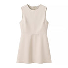 Elegant langry beige sleeveless peplum dress with back zipper