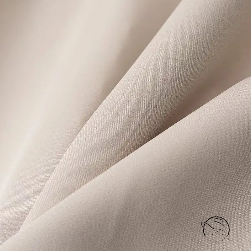 Elegant cream linen fashion dress with subtle texture weave