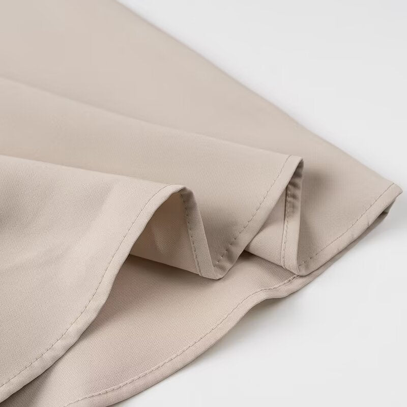 Elegant langry beige satin skirt with ruffled hem in fashion two-piece set