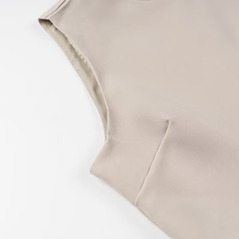 Elegant Langry fashion beige sleeveless top with high neckline