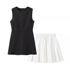 Elegant slim fit langry fashion black sleeveless dress with white pleated skirt