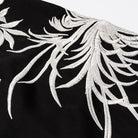 Black and white floral embroidered t-shirt in Langry fashion ملابس