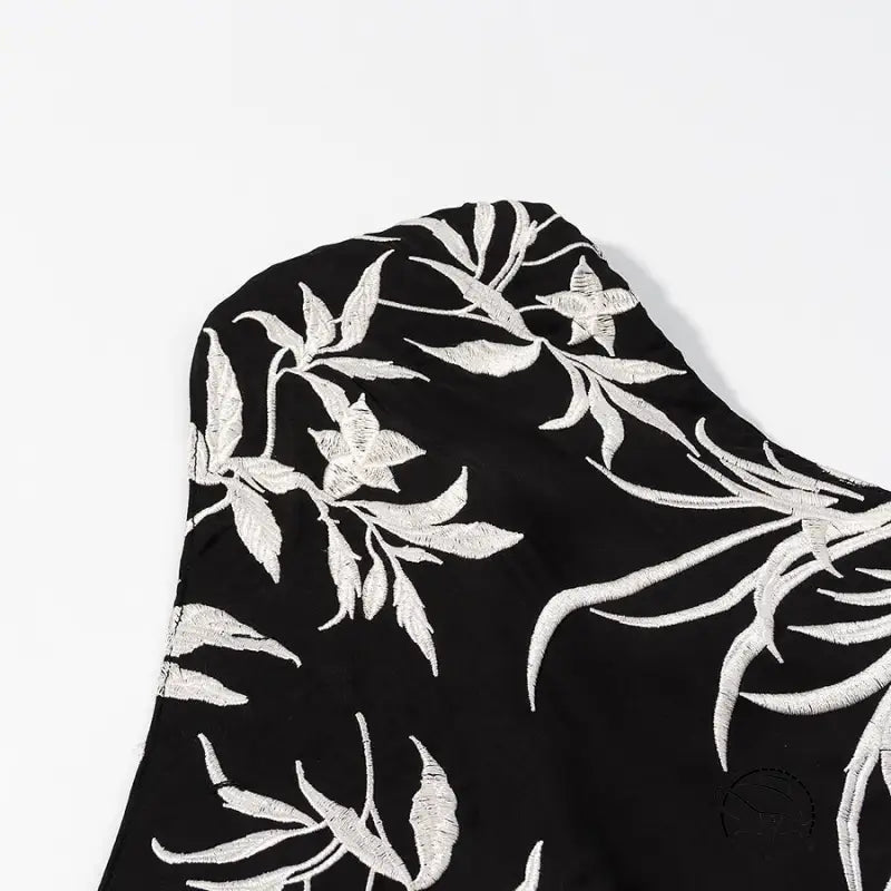 Black and silver floral scarf with metallic accents on langry fashion dress