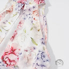 Madewell floral print chiffon blouse with pink purple flowers on white background