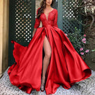 Elegant princess dress in red with high slit for trailing banquet evening