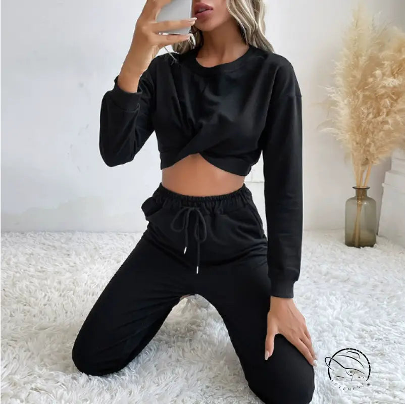 Casual black two-piece langry fashion set with twisted crop top and drawstring pants
