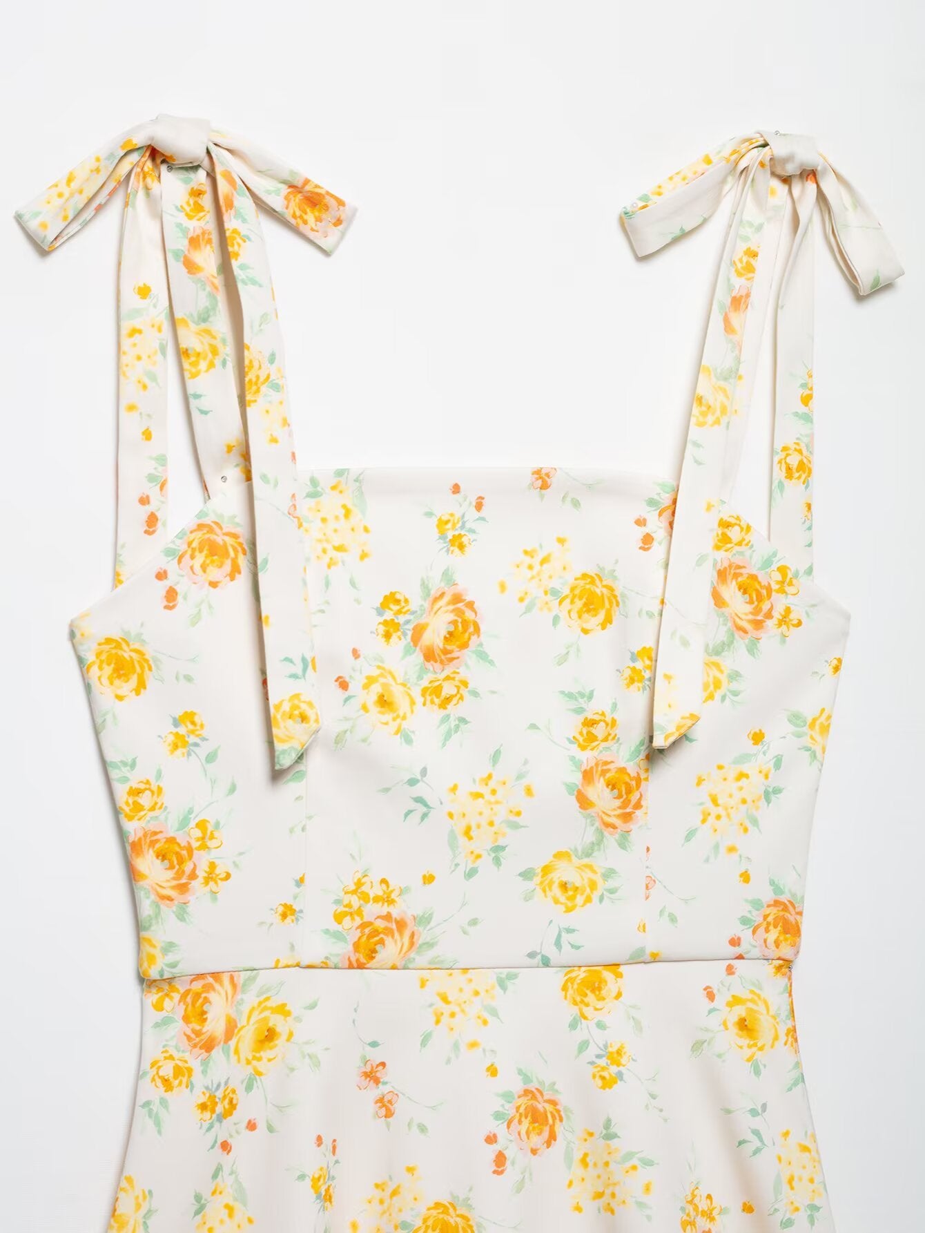 Langry fashion Bowknot Floral Printed Poplin Dress with white floral print, yellow roses, green leaves, and tied straps