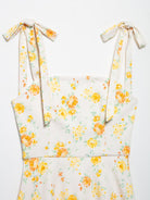 Langry fashion Bowknot Floral Printed Poplin Dress with white floral print, yellow roses, green leaves, and tied straps