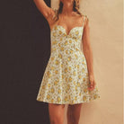 Langry white floral print poplin slimming mini dress with yellow accents and gold straps