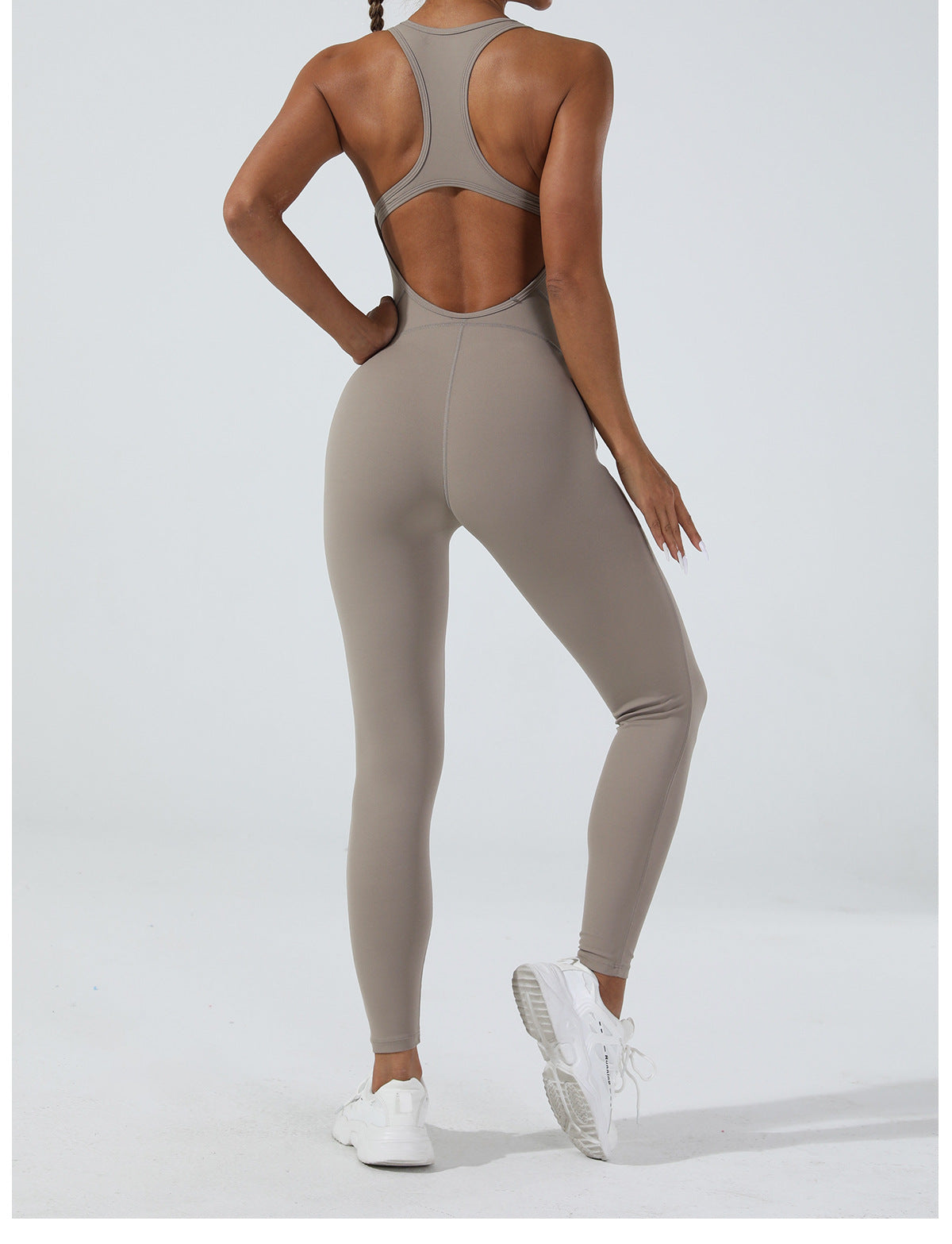 Sleek taupe langry yoga one-piece jumpsuit in stretchy fashion ملابس