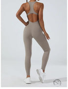 Sleek taupe Langry yoga one-piece jumpsuit in stretchy fashion ملابس