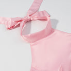 Pink langry satin halter swimsuit with bow detail in elegant fashion dress