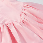 Elegant langry fashion pink satin dress with ruched bodice and bowknot lace up skirt