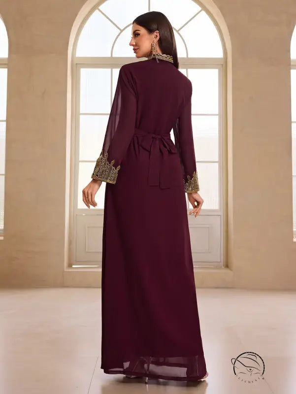 Elegant burgundy chiffon abaya with gold embroidery and drawstring waistband in langry fashion