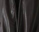 Close-up of Langry faux leather zipper jacket, loose thick warm short fashion style