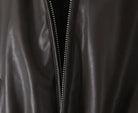 Close-up of Langry faux leather zipper jacket, loose thick warm short fashion style