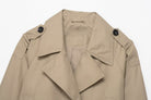 Casual double breasted short trench coat in beige with black buttons