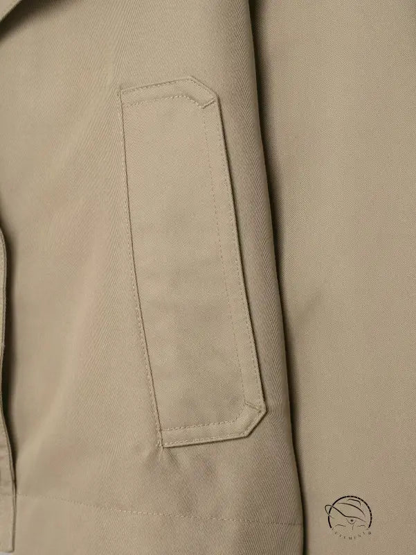 Beige double breasted short trench coat with laptop sleeve pocket