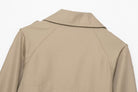 Casual double breasted short trench coat in beige with epaulettes
