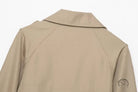 Casual double breasted short trench coat in beige with epaulettes
