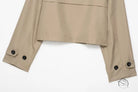 Casual double breasted short trench coat in beige with buttoned cuffs