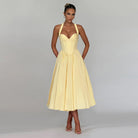 Langry fashion yellow halter-neck A-line maxi dress with pleated skirt and pockets