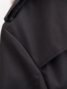 Stylish Langry fashion black leather jacket with fur collar and button closure