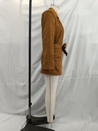 Elegant langry fashion suede blazer in brown corduroy with white pants and red stripe