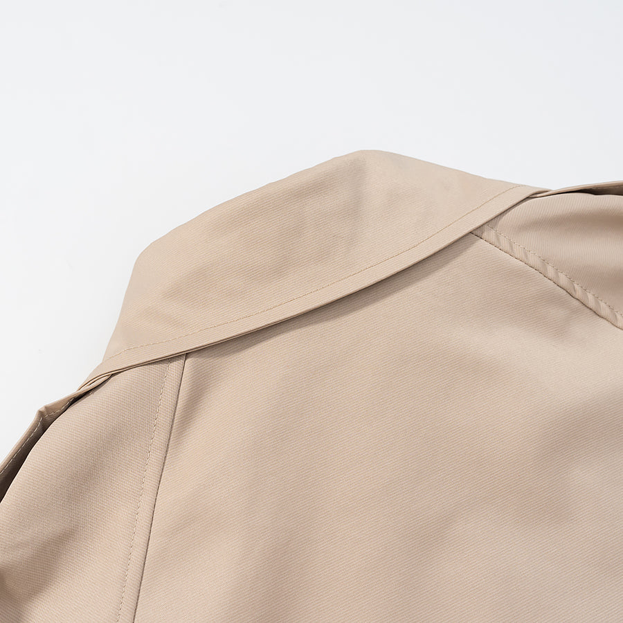 Casual long sleeve belt short trench coat in beige with double-breasted fashion design