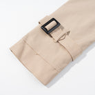 Beige cargo pants with black buckle closure in Langry fashion ملابس