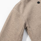 Beige wool coat with black buttons in Langry fashion ملابس
