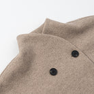 Langry fashion beige wool coat with black buttons and lapels