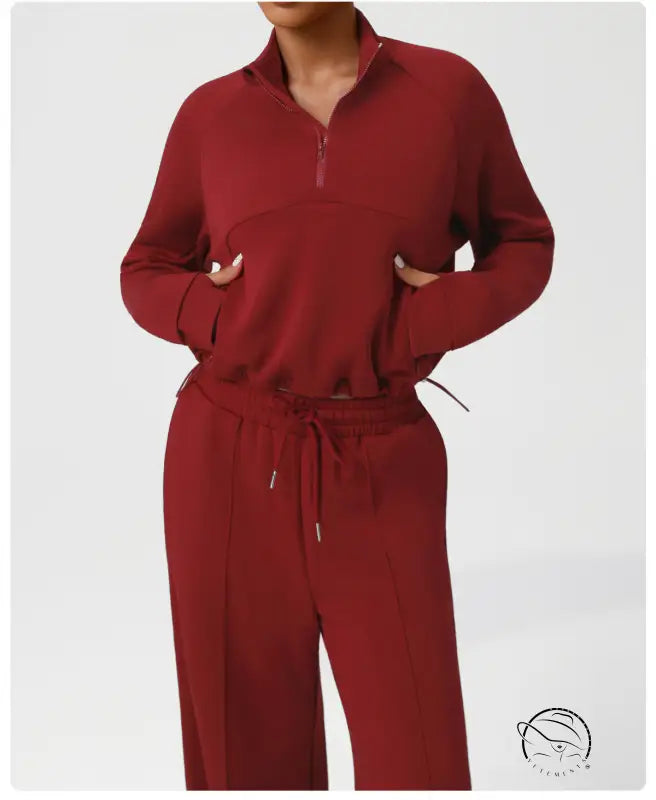 Red Lululemon zip-up jumpsuit with drawstring waist and pockets in langry fashion