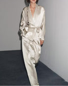 Elegant langry silver silk pajama set with deep V-neck and wide-leg pants