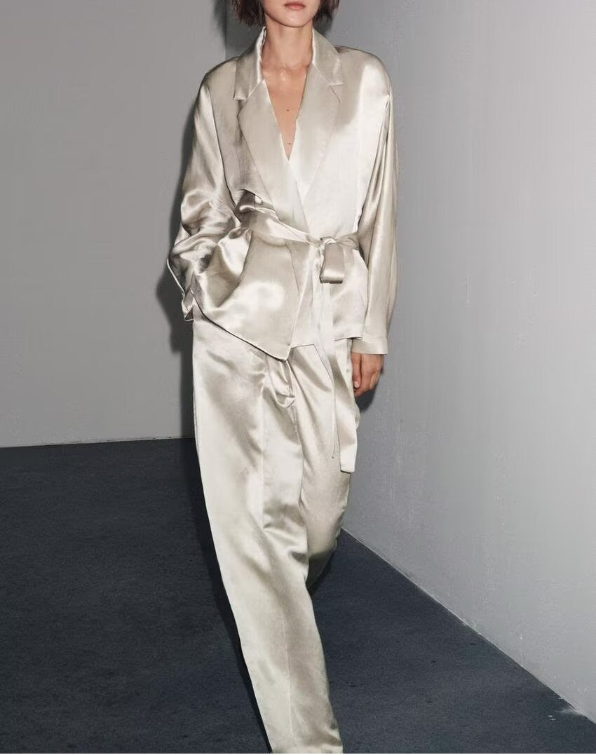 Elegant langry silver silk pajama set with deep V-neck and wide-leg pants