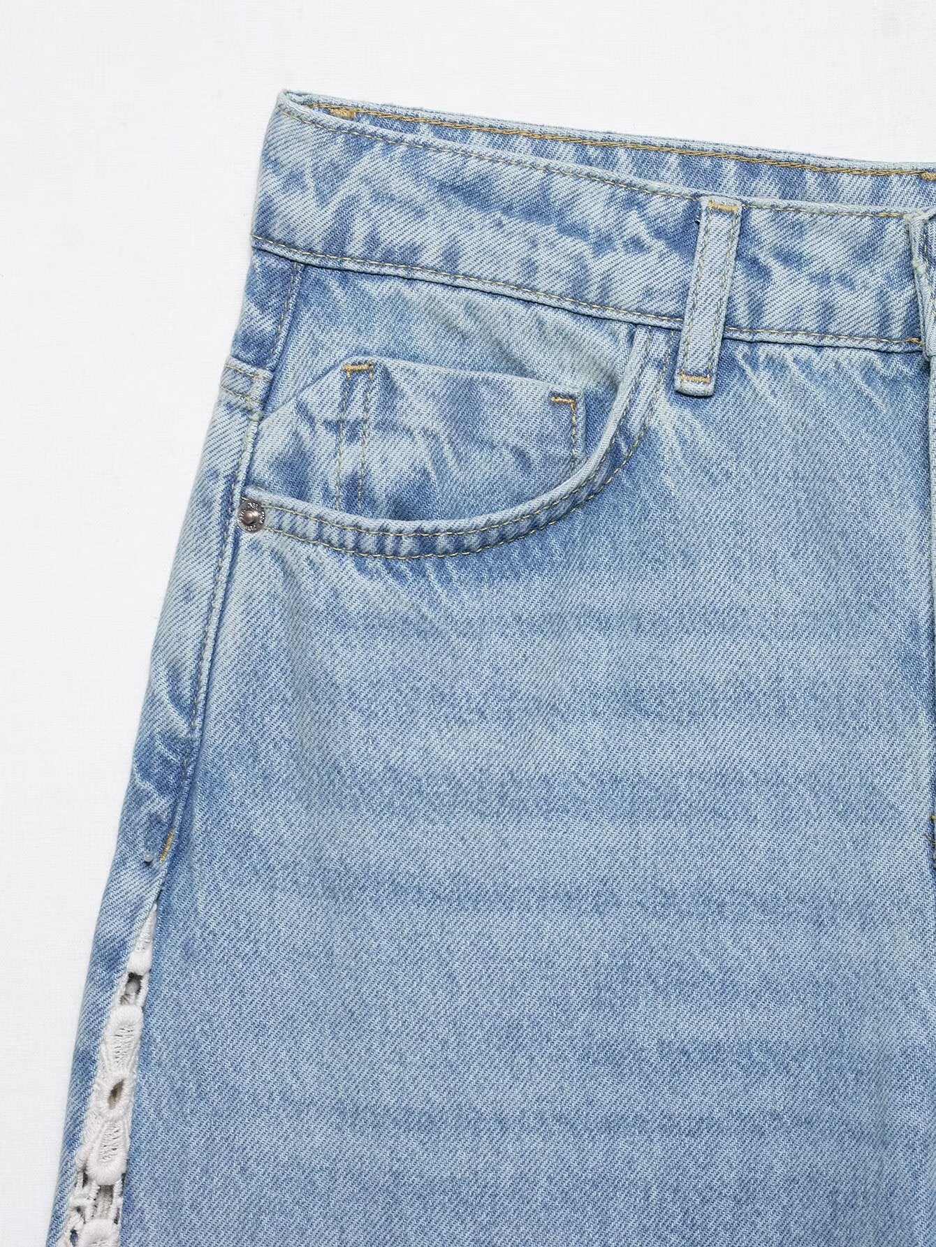 Light blue wide leg denim skirt with side zipper and pocket detail