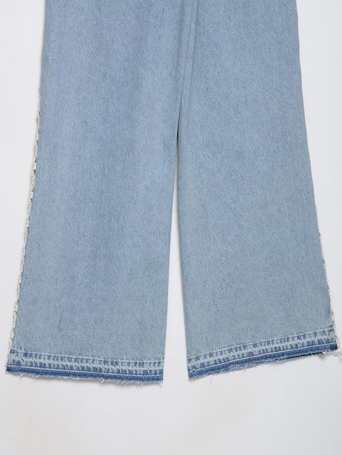 Light blue wide leg Langry fashion jeans with frayed hem and crochet stitching