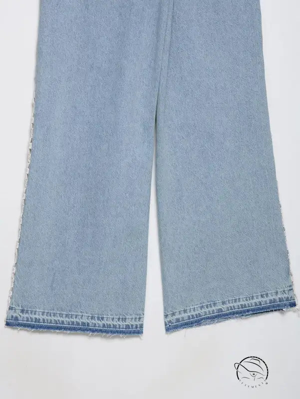 High waist wide leg jeans in light blue denim with frayed hem and crochet stitching