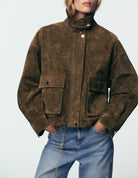 Brown suede leather bomber jacket with patch pockets and chain detail